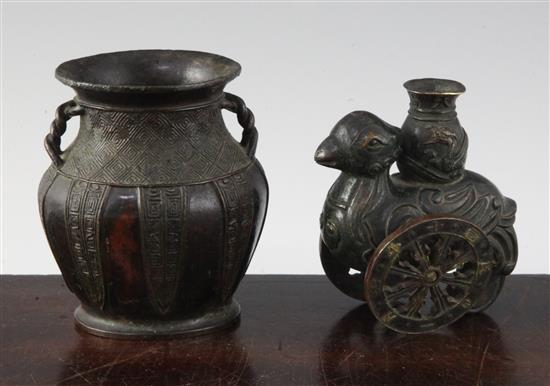 A Chinese small bronze phoenix vase and an archaistic bronze vase, 17th / 18th century, 8.8 and 9.5cm (2)